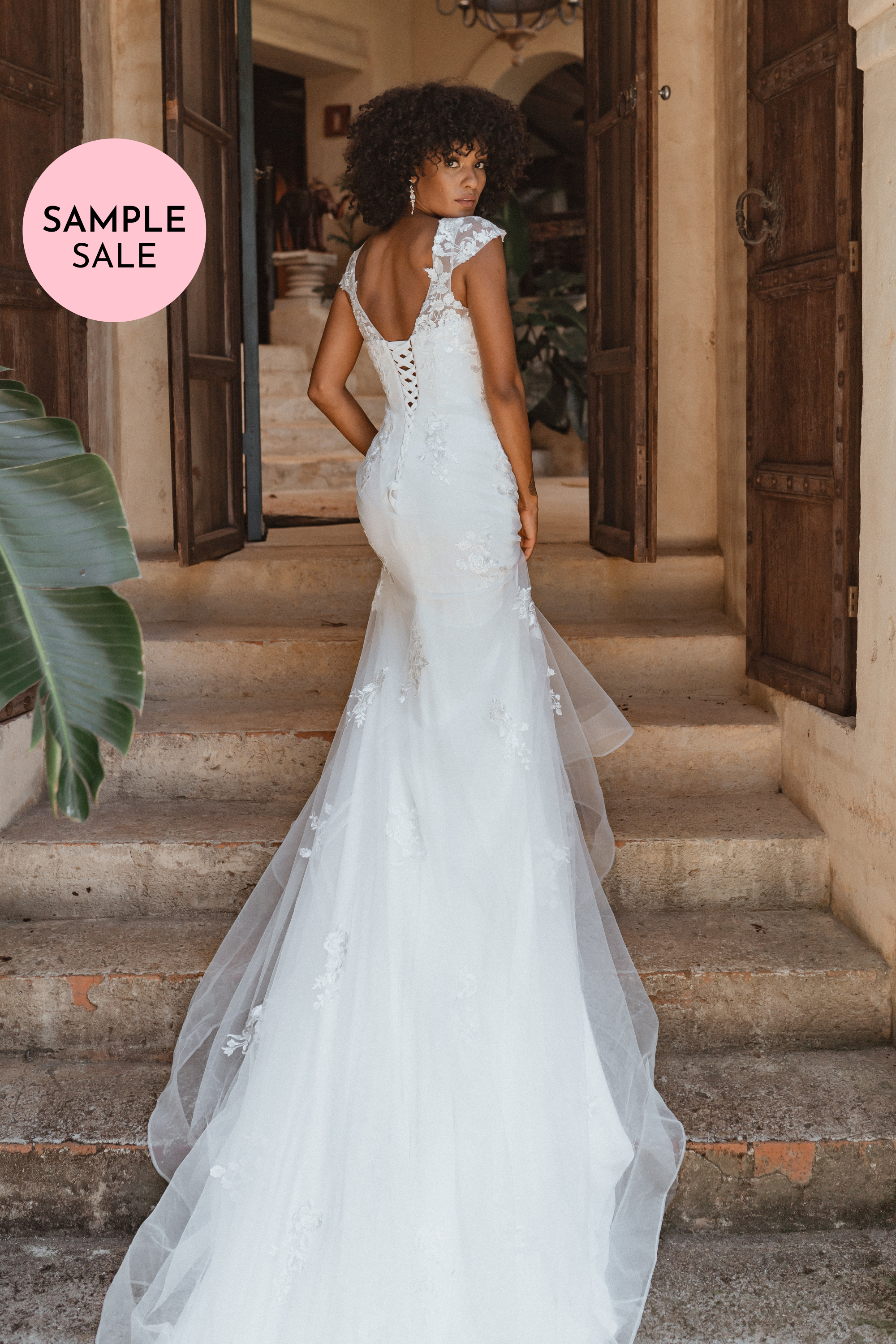 Cap sleeve fit top and flare wedding dress